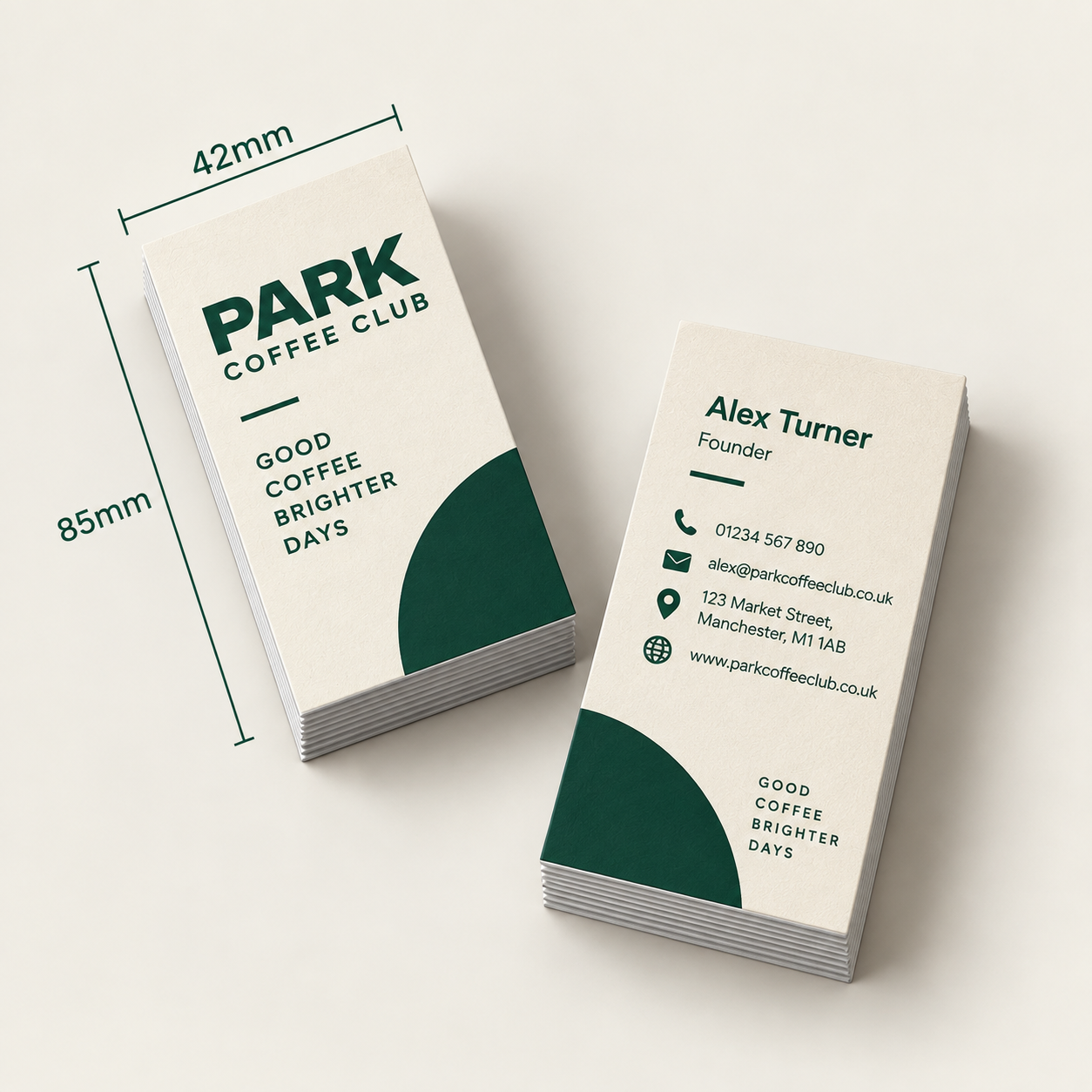 Slim branded café business cards shown front and back with 85 by 42 millimetre dimensions