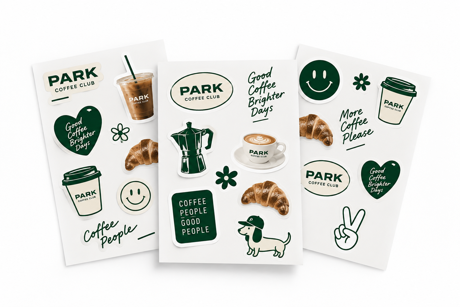 Three café sticker sheets containing a mix of branded labels and illustrated designs