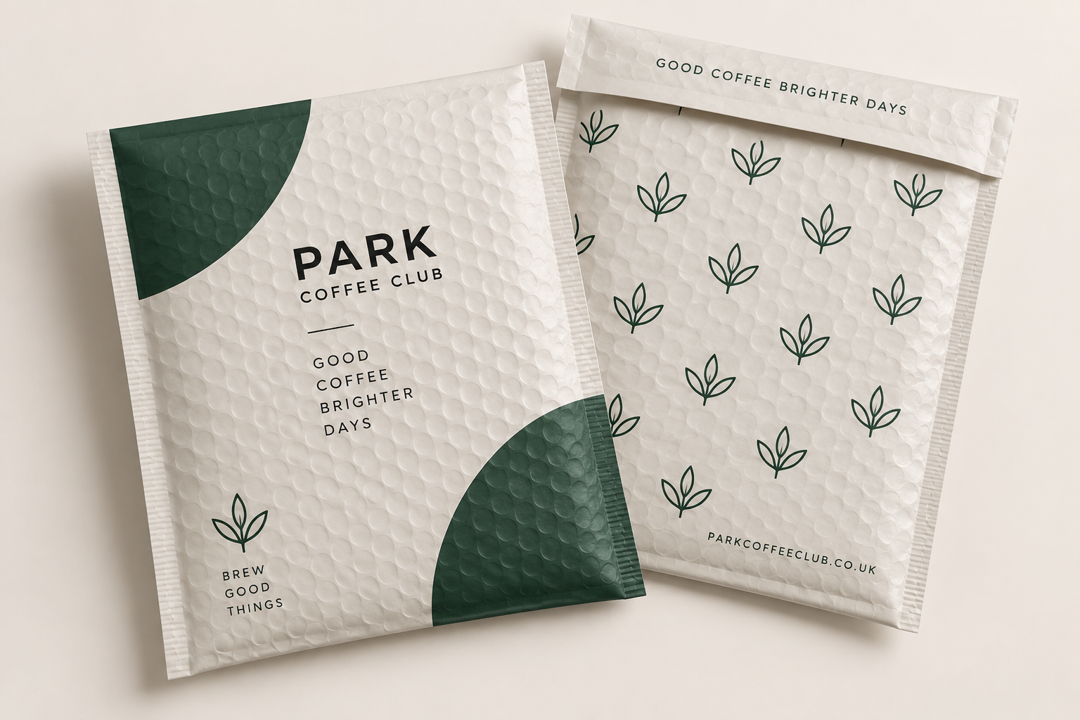 Front and reverse of custom-printed white padded bubble mailers
