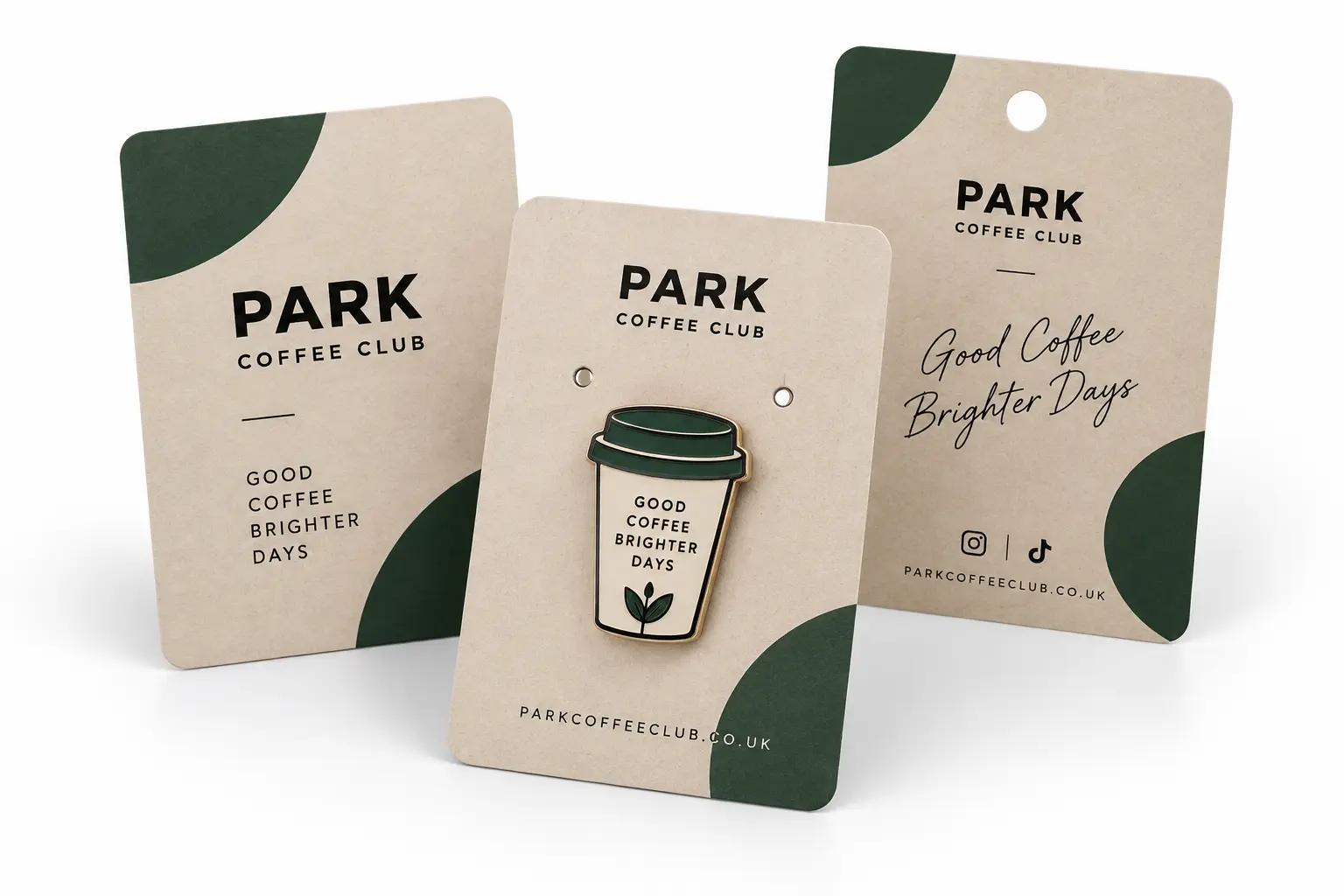 Three custom-printed retail backing cards with punched holes
