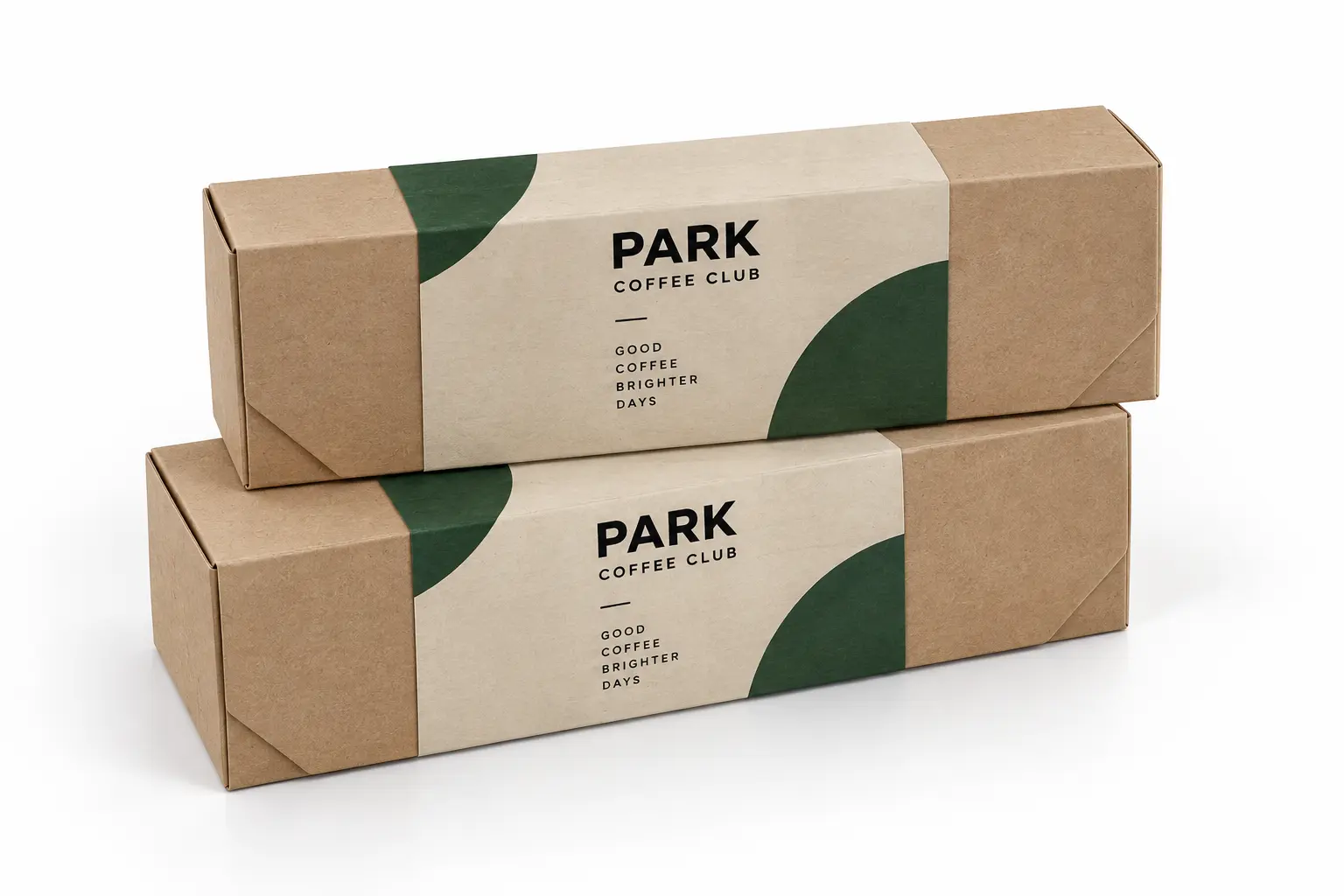 Two kraft boxes wrapped with custom-printed paper sleeves